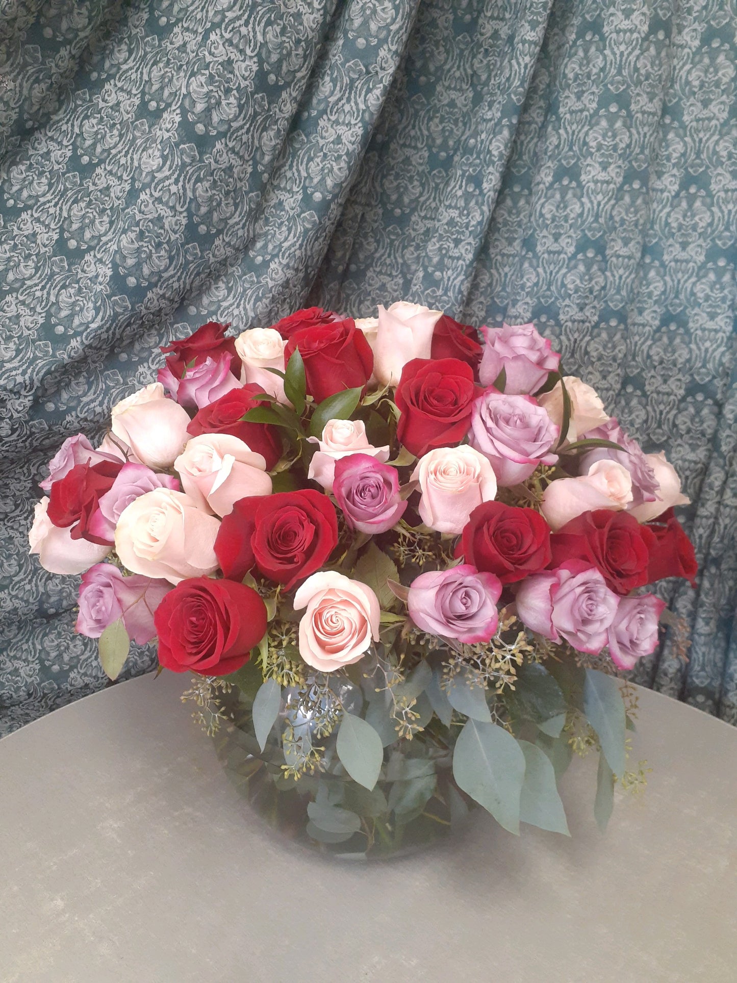 5 Dozen Roses in a Glass Bowl